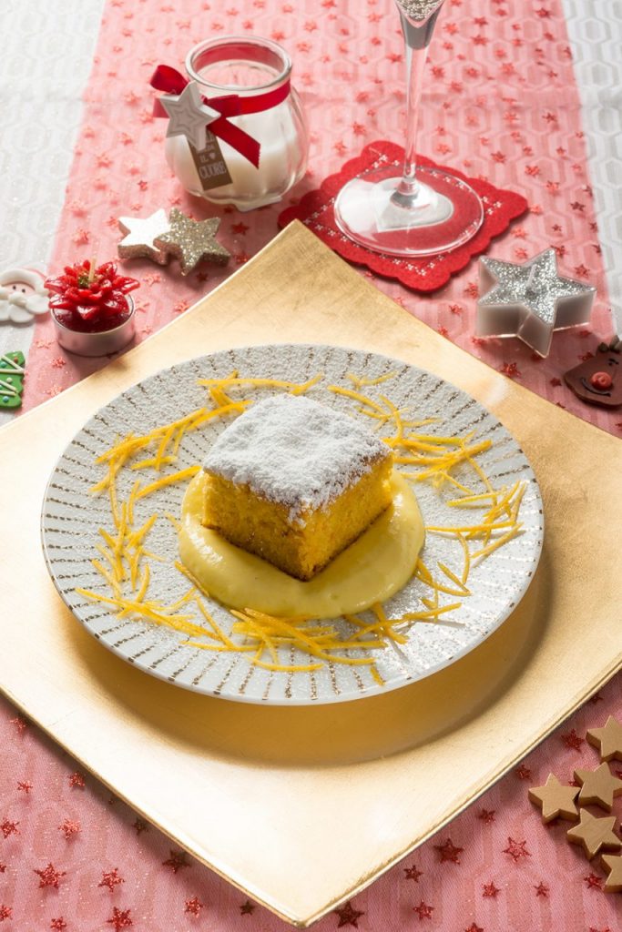 Tortino all'arancia con salsa al cioccolato bianco
